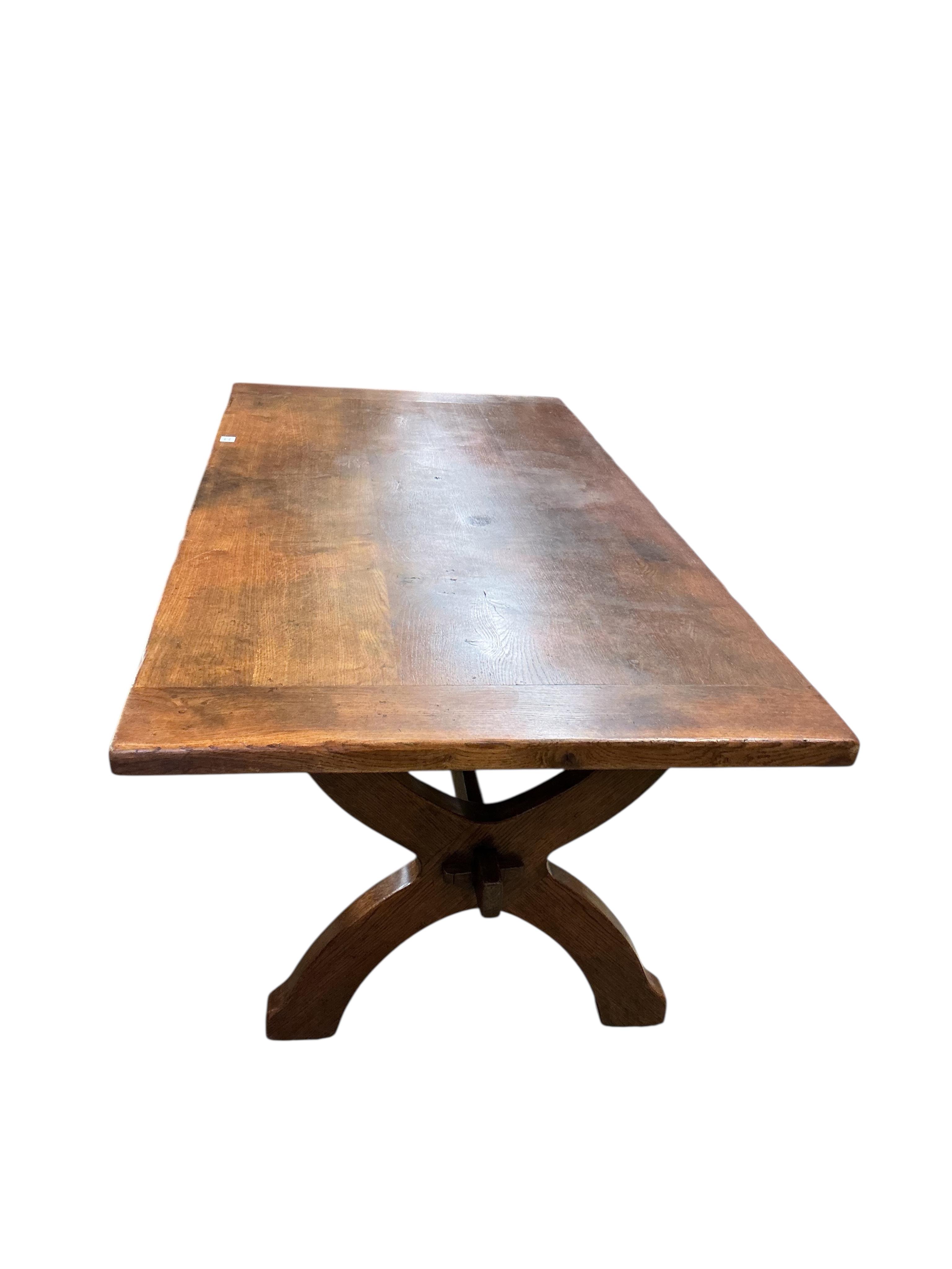 An 18th century style rectangular oak tavern or refectory dining table, width 197cm, depth 95cm, height 76cm